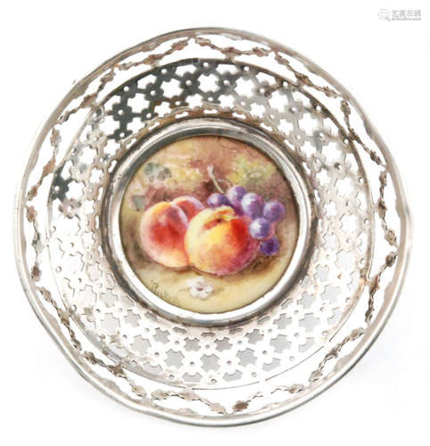 An early 20th Century Royal Worcester Fallen Fruits roundel decorated by Ricketts with hand painted peaches and grapes