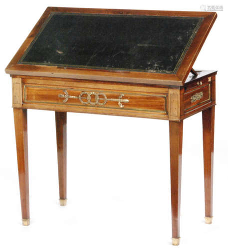 A 19th Century French Empire style classical revival mahogany writing table