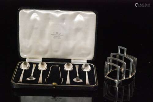 An Art Deco hallmarked silver four division toast rack