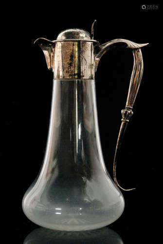 An Edwardian hallmarked silver claret jug