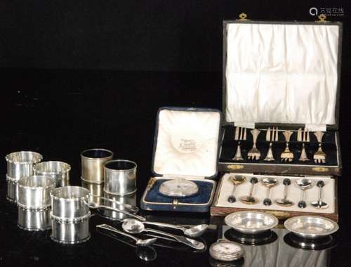 A small parcel lot of assorted hallmarked silver items to include four napkin rings