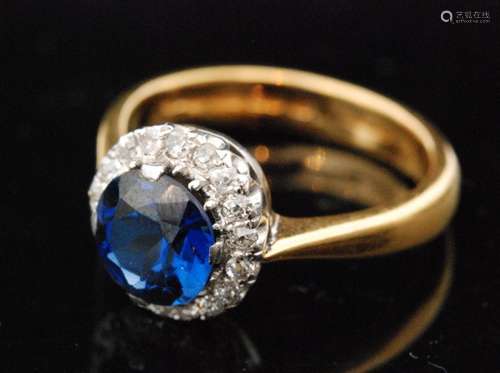 An early 20th Century hallmarked 22ct synthetic sapphire and diamond ring