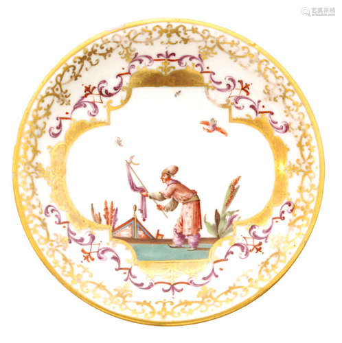 An 18th Century Meissen Chinoiserie saucer hand painted in the  manner of J.G Horoldt with a scene similar to the Schulz Codex