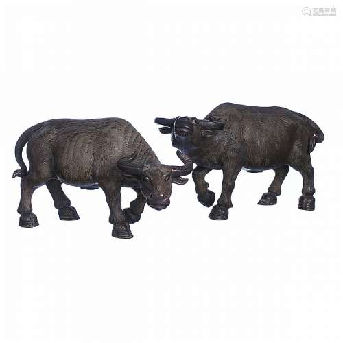 Pair of water buffalo in chinese porcelain