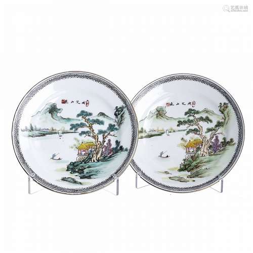 Pair of small 'landscape' dishes in Chinese porcelain