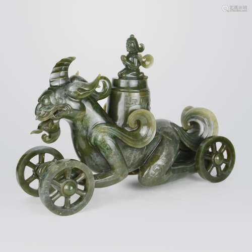 Spring and Autumn Period, A Fine and Rare Celadon Jade Minotaur as Chariot Carrying Treasures Guided by Fairy as Finial on Jun and with Four Locking Wheels 春秋 稀有青玉雕塑兽首人身羽人盖尊四活轮宝车