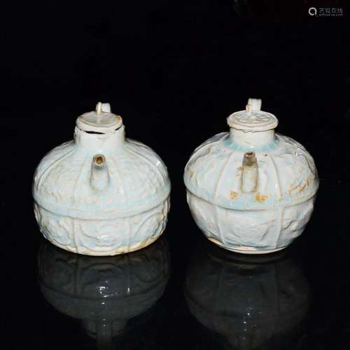 Song Dynasty, A Pair of Yingqing Lobed Ewer and Cover 宋 影青印花单系把壶一对