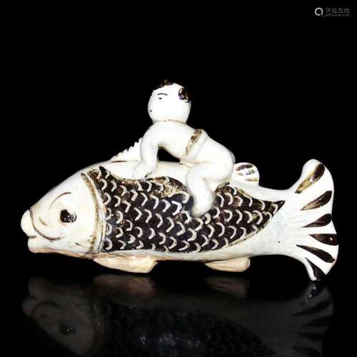 Northern Song Dynasty, Cizhouyao Child Riding Fish Ornament 北宋 磁州窑白地墨彩婴戏骑鱼摆件