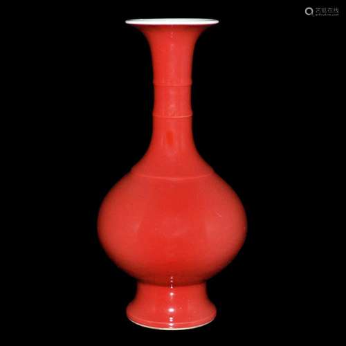 Qing, A Fine Copper-Red Glazed Ribbed Vase 清 乾隆 红釉长颈玄云纹撇口瓶