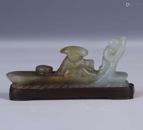 A CARVED JADE 'FIGURE AND BOAT' BRUSH RACK