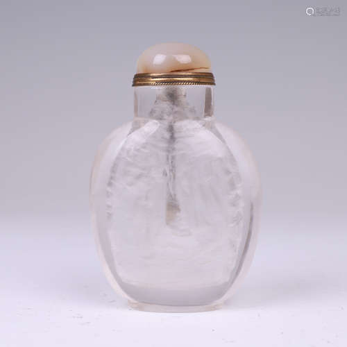 A GLASS LIDDED SNUFF BOTTLE