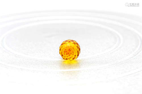 A GERMAN AMBER BEAD