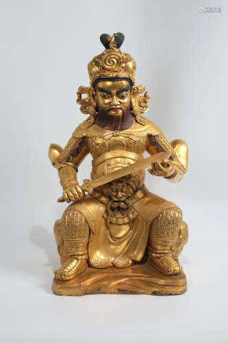 CHINESE GILT BRONZE SEATED GUARDIAN