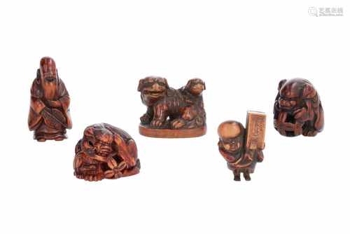 Lot of five netsuke, 1) Wooden Fukusuke with trunk. Signed. H. 3,5 cm. 2) Wooden shishi with cub and