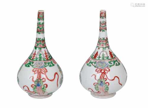 A pair of Famille Verte porcelain sprinkler vases, decorated with vases and ribbons. Unmarked.