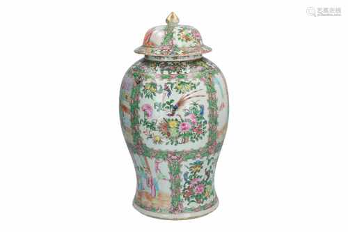 A polychrome porcelain baluster vase, decorated with flowers, birds and panels depicting scenes from