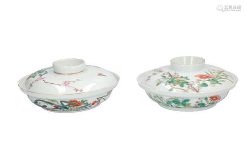 A lot of two polychrome porcelain bowls with cover, decorated with flowers. Marked with 6-