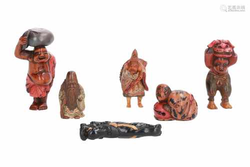 Lot of six netsuke, 1) Ebony wood with lacquer, running shishi. L. 6 cm. 2) Wood with lacquer,