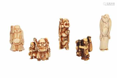 Lot of five netsuke, 1) Ivory with inlay, Jurojin with fan, staff, karako and hoho-bird. Signed