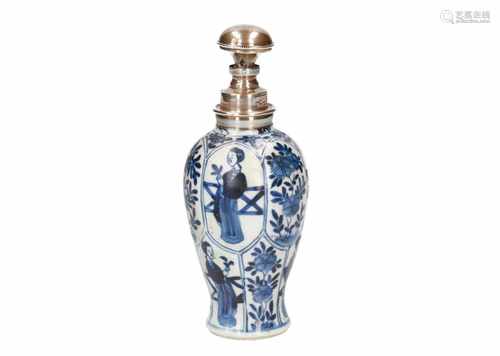 A blue and white porcelain vase, decorated with long Elizas and flowers. With later silver mounts.