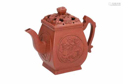 A square Yixing teapot with a relief medallion on all sides, depicting a bird sitting on a flower