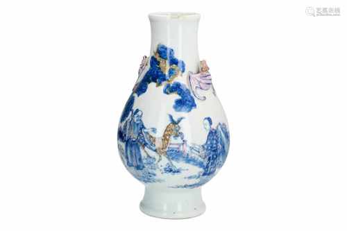 A Doucai porcelain vase, decorated with two figures and a mythical animal. The grips in the shape of