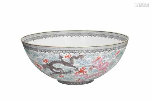 A large polychrome eggshell porcelain bowl, decorated with dragons chasing the burning pearl. Marked