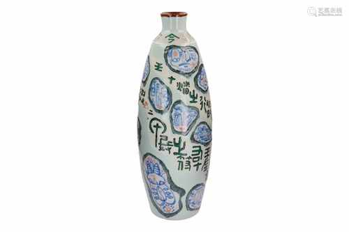 A large polychrome porcelain vase, decorated with characters and masks. Unmarked. China, 20th