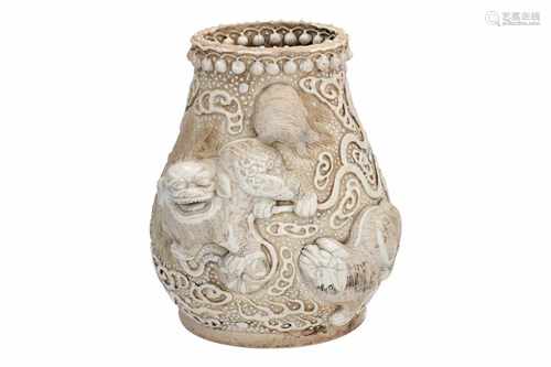 A biscuit porcelain vase with relief decor of qilins. Marked with seal mark Chenghua. China, ca.