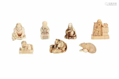 Lot of six netsuke and one obidome, 1) Ivory shishi with ball on base. Signed Miukoku. H. 2,5 cm. 2)