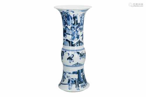 A blue and white porcelain vase with flaring rim, decorated with scenes with figures and little