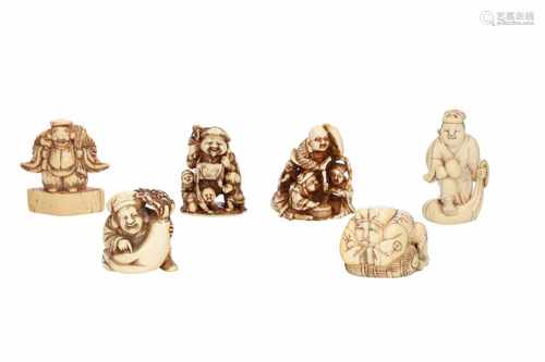 Lot of five netsuke, 1) Ivory Daikoku in bag, held by two karako. Signed Sauko. H. 5 cm. 2) Ivory