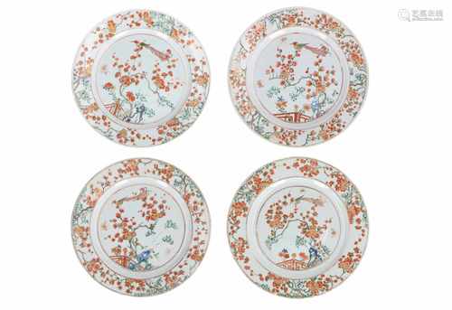 Set of four Famille Verte porcelain dishes, decorated with bird in tree and flowers. Marked with