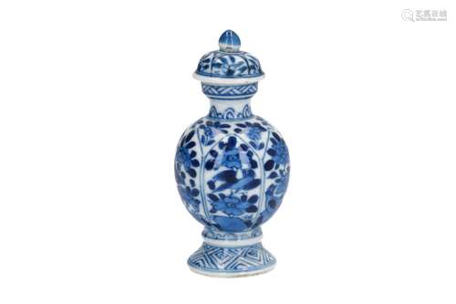 A blue and white porcelain miniature baluster vase, decorated with flowers and birds. Marked jade.