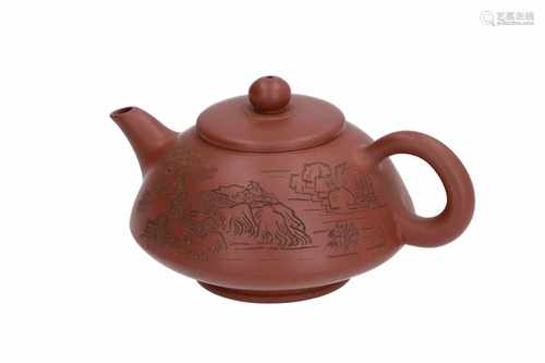 A Yixing teapot, decorated with a landscape and calligraphy. Marked with seal mark. China, 20th