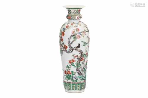 A Famille Verte porcelain vase in Kangxi style, decorated with birds in a blossoming tree and