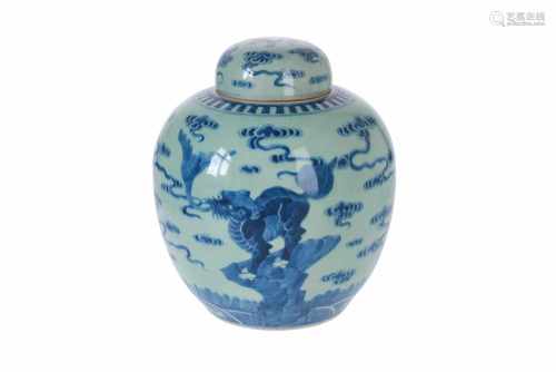 A green glazed porcelain ginger jar with blue decor of three fantasy animals. Marked with 6-