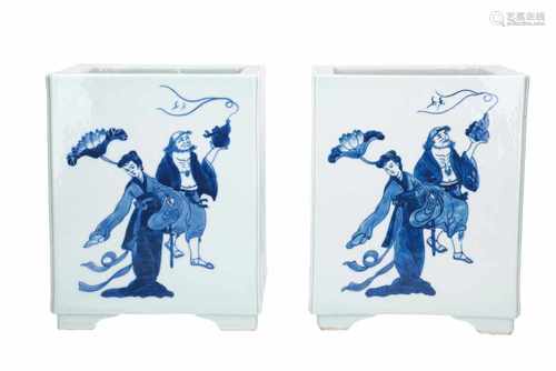 A pair of square blue and white porcelain cachepots, decorated with figures. Unmarked. China, 20th