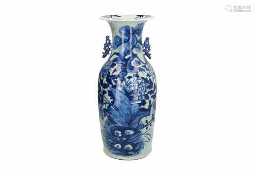 A blue and white porcelain vase with two handles, decorated with birds and flowers. Unmarked. China,