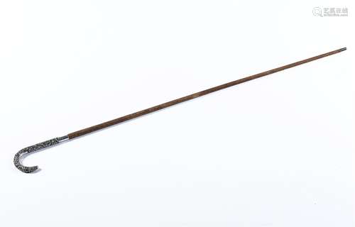 A walking cane with silver handle, decorated with bamboo, crane and dragon. China, ca. 1900. H. 99