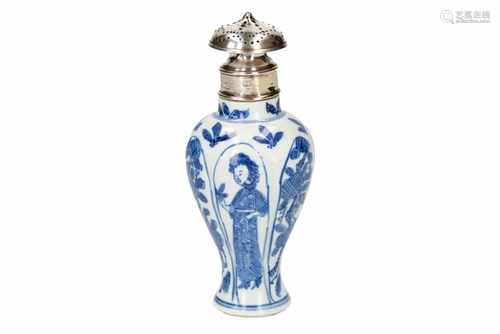 A blue and white porcelain caster, decorated with figures and fruits, with Dutch silver mounting.