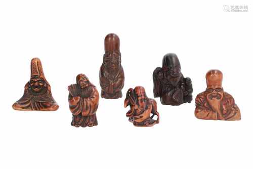 Lot of six netsuke, 1) Wooden sitting Jurojin. H. 4,5 cm. 2) Wooden Jurojin with hammer, fan and