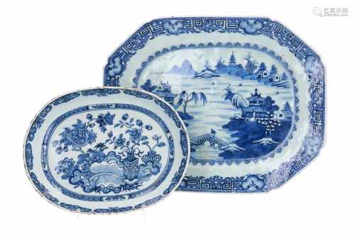 A blue and white porcelain serving dish, decorated with river landscape with figures and