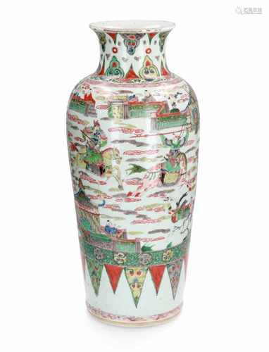 A large Famille Verte porcelain 'warrior' vase. Unmarked. China, Kangxi. On wooden base. H. 51,5 cm.