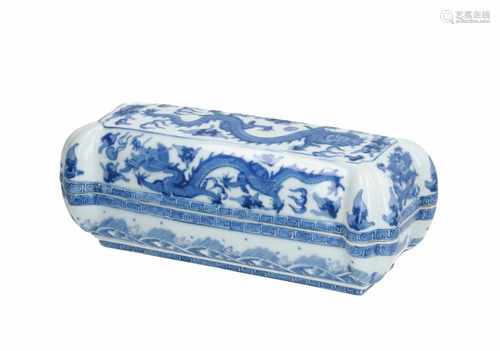 A rectangular blue and white porcelain lidded box, decorated with dragons. Marked with 6-character