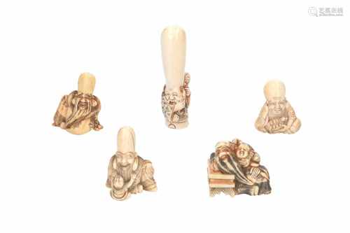 Lot of six netsuke, 1) Ivory shishi with ball. H. 2,5 cm. 2) Ivory shishi. H. 2,5 cm. 3) Ivory