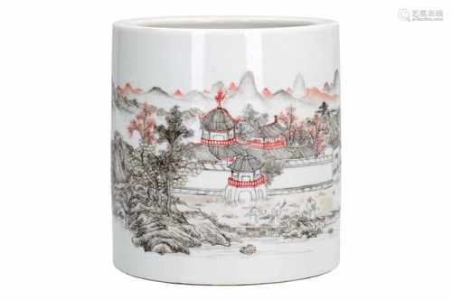 A porcelain brush pot, decorated in red and black with a mountainous landscape. Marked with seal