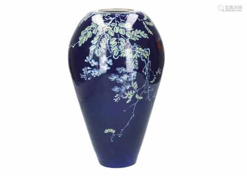 A polychrome porcelain vase, decorated with trees on a blue background. Dated 1990. Signed Shu Hui