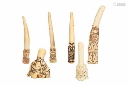 Lot of five netsuke, 1) Ivory with inlay Fukurokuju with hat. Signed. H. 4,5 cm. 2) Staghorn