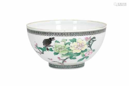 A polychrome eggshell porcelain bowl, decorated with a bird and flowers. Marked. China, late 20th